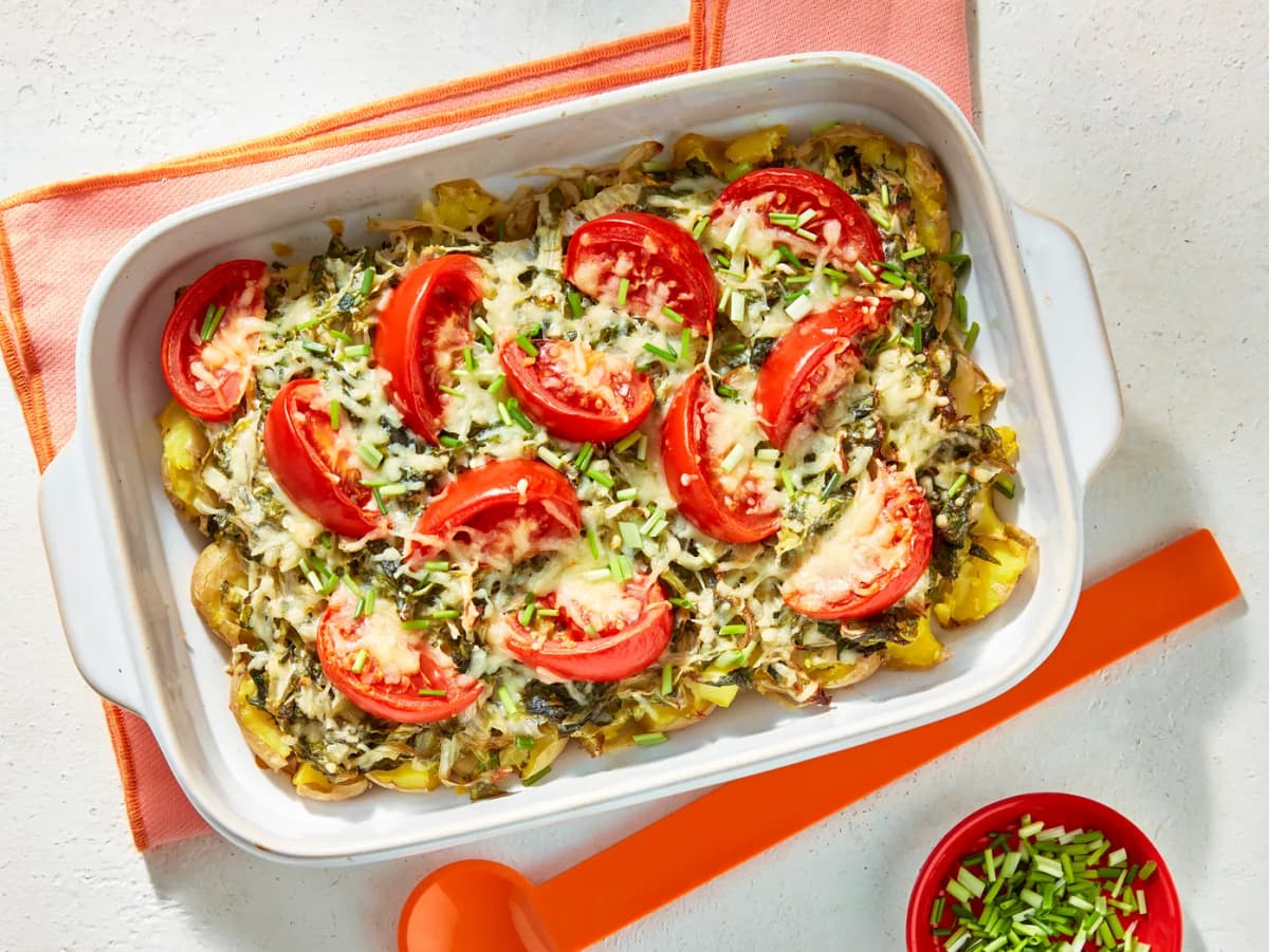 Gegratineerde andijvie met tomaat en bieslook