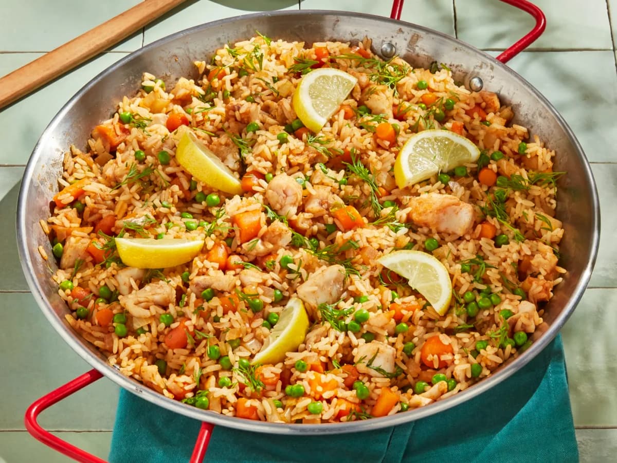 Paella met koolvis en citroen
