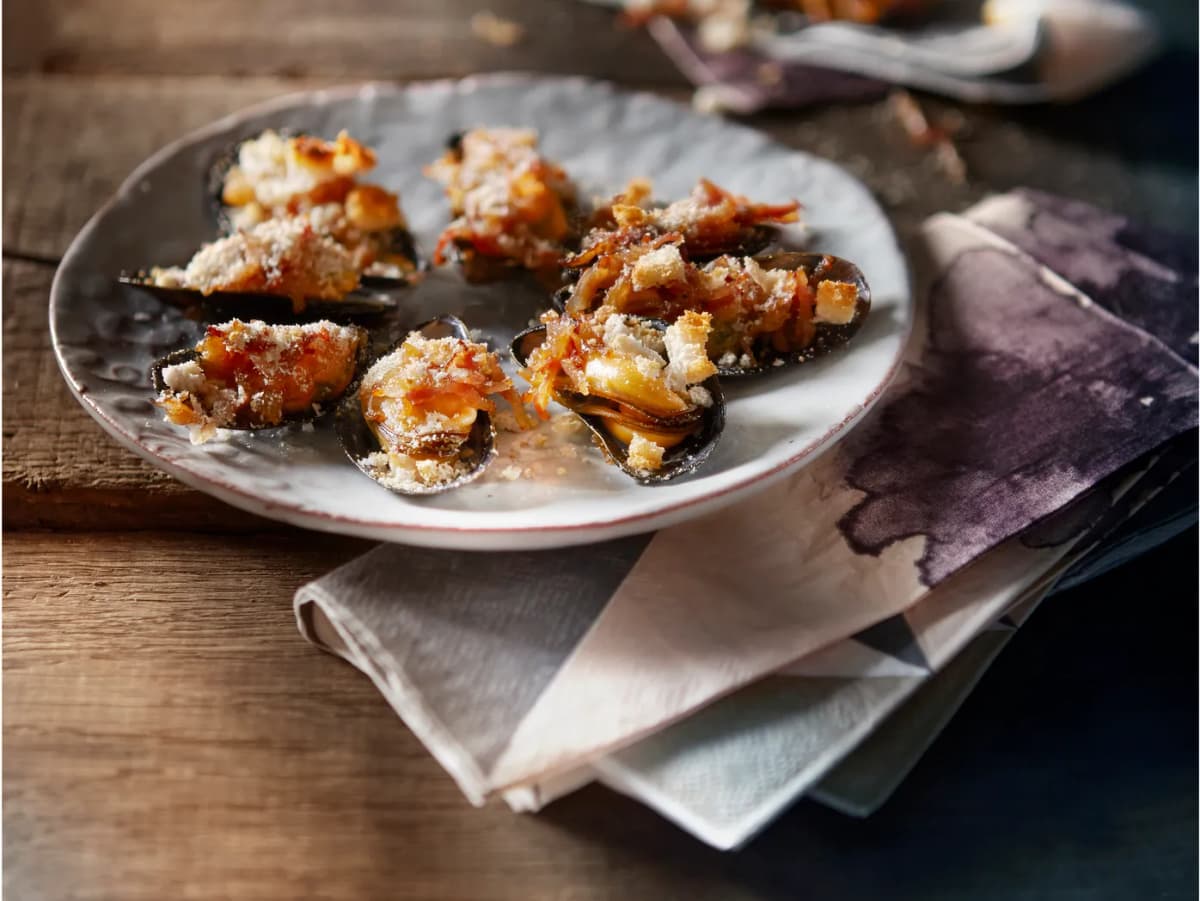 Gegratineerde mosselen met spek