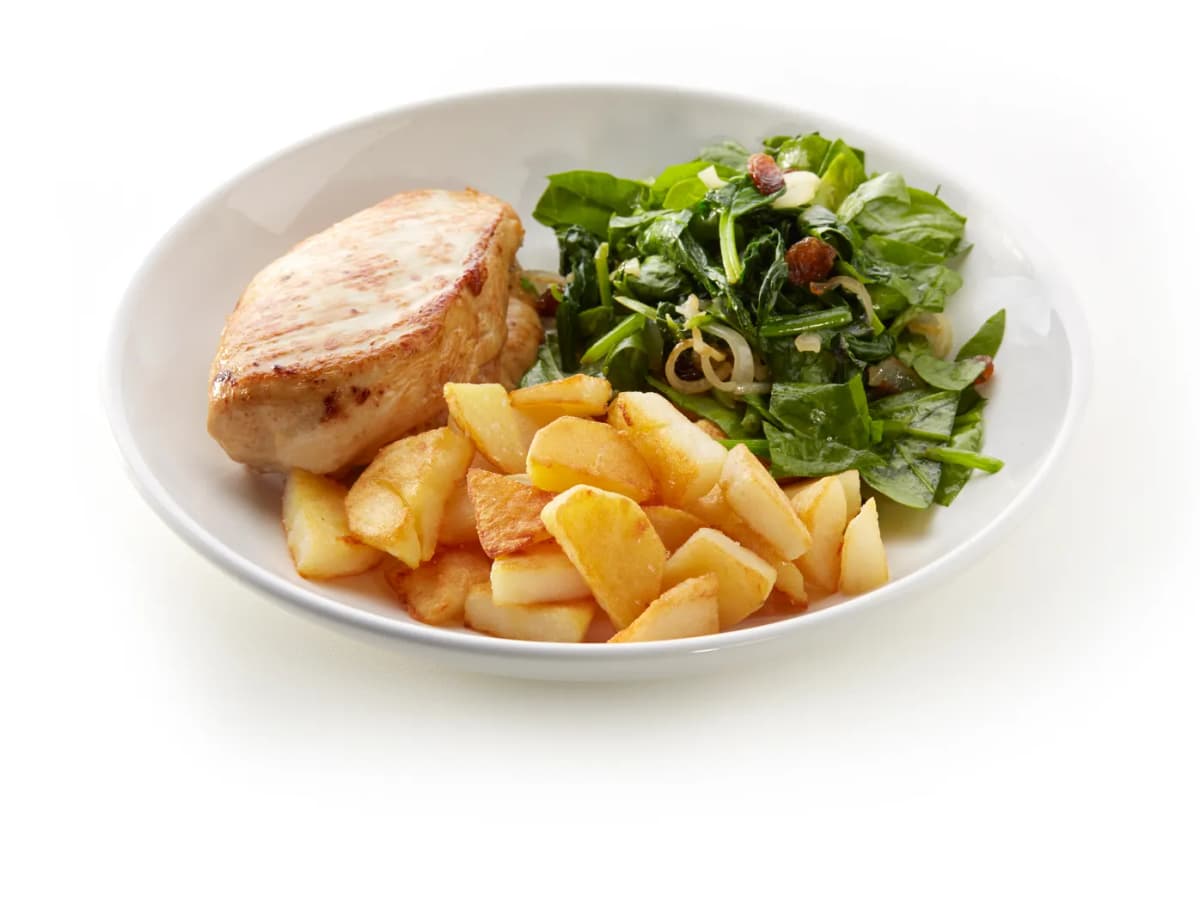 Kipfilet met spinazie, rozijnen en gebakken aardappelpartjes