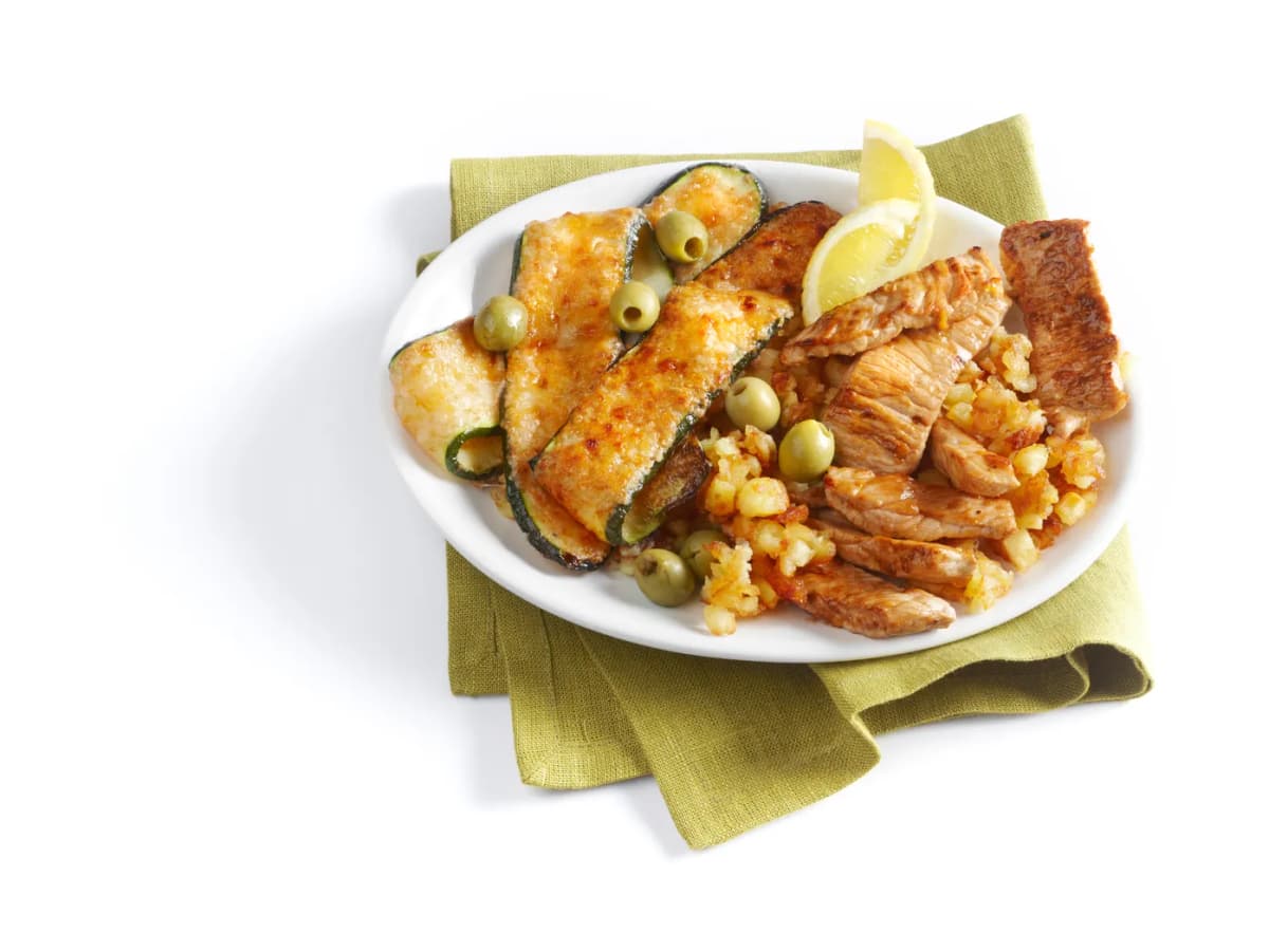 Gegratineerde courgette met citroenschnitzel